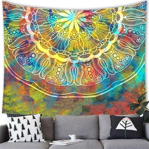 Detailed close-up of vibrant galaxy mandala tapestry hanging on a modern living room wall