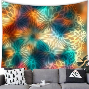 Detailed close-up of vibrant mandala tapestry hanging above a grey sofa in a modern room
