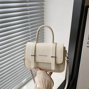 Cream white crossbody messenger bag with litchi texture flap and top handle for women