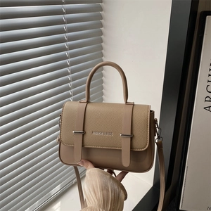 Khaki pebbled leather messenger bag with top handle and Fashion & Bags lettering