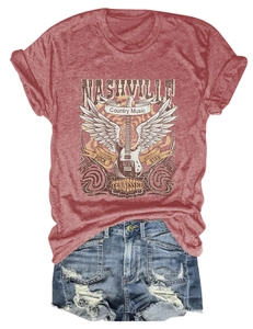 Close-up of Nashville country music print on a red heather vintage t-shirt and denim shorts