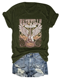Detail of Nashville country music vintage guitar print on olive green t-shirt with denim shorts