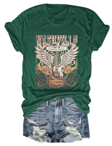 Close-up of Nashville country music dark green t-shirt with ripped denim shorts