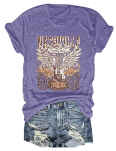 Flat lay of vintage Nashville country music t-shirt and distressed denim shorts set