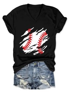 Flat lay of a black V-neck T-shirt with baseball graphic and distressed denim shorts