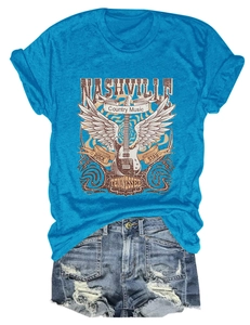 Flat lay of blue Nashville country music t-shirt with electric guitar and wings print