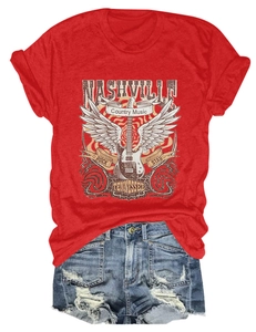 Close-up of Nashville Tennessee graphic tee with electric guitar and denim shorts