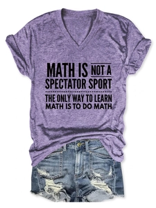 Flat lay of purple V-neck math t-shirt with slogan and distressed denim shorts