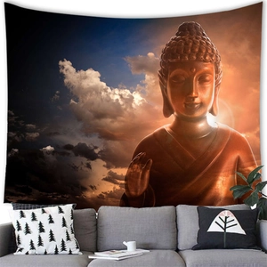 Detail of Buddha wall tapestry hanging over a grey sofa in a zen living room setting