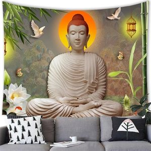Zen Buddha meditation tapestry hanging over a gray sofa in a modern living room