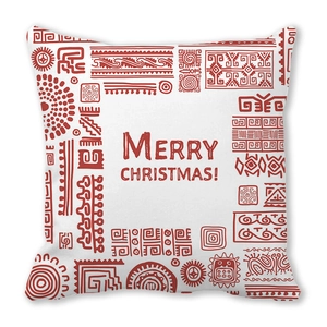 Détail du coussin carré Joyeux Noël avec motifs ethniques rouges et texte festif