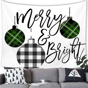 Detailed view of Merry & Bright Christmas tapestry hanging above a sofa in a cozy room
