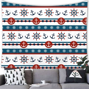 Detail of nautical tapestry with anchors and rudders hanging above a sofa in a living room