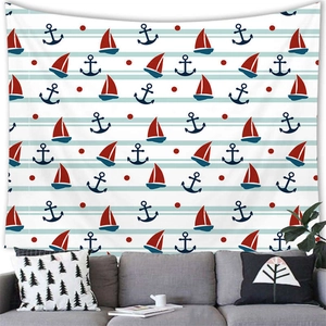 Close-up of nautical tapestry featuring red sailboats and blue anchors on striped fabric