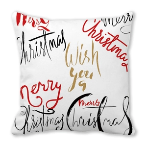 Close-up detail of soft peach skin pillowcase with festive Merry Christmas text