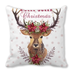 Détail de housse de coussin de Noël avec renne à l'aquarelle et texte festif
