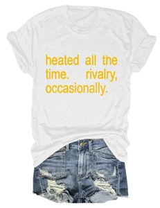 White crew neck T-shirt with yellow text print paired with distressed denim shorts