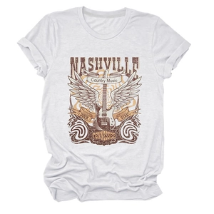 Close-up of white Nashville country music T-shirt featuring guitar and wing graphic