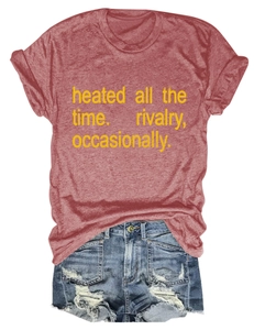 Detail of rust red t-shirt with text and distressed light blue denim shorts set