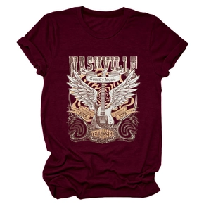 Detail of Nashville country music t-shirt with vintage electric guitar and wings graphic