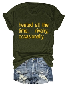 Flat lay of dark green crew neck T-shirt with yellow text and denim shorts on white background