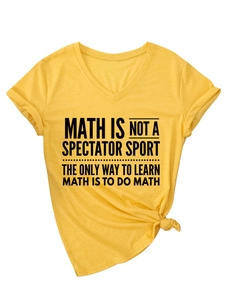 Detail of yellow V-neck T-shirt showing rolled sleeves, front knot, and math slogan
