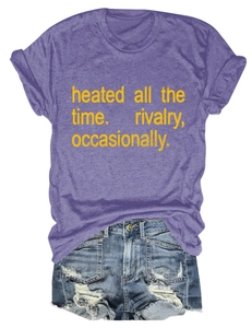Detail of purple cotton blend T-shirt with yellow print and ripped denim shorts set