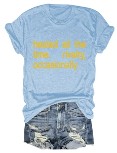 Detail of short sleeve T-shirt with 'heated all the time' text and ripped denim shorts
