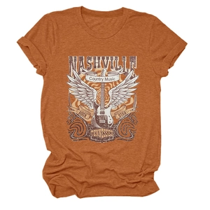 Detail of Nashville country music print with winged guitar on rust orange cotton T-shirt
