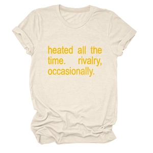 Detailed view of the crew neck collar and yellow text print on the beige casual t-shirt