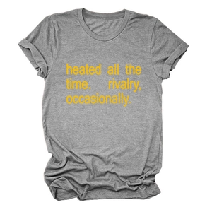 Close-up of heather gray t-shirt fabric with yellow text heated all the time print