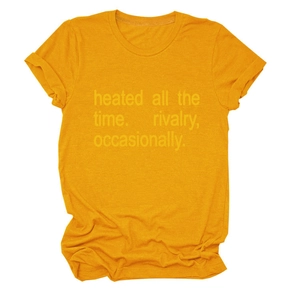 Detail of mustard yellow cotton T-shirt featuring low-contrast slogan print on the chest
