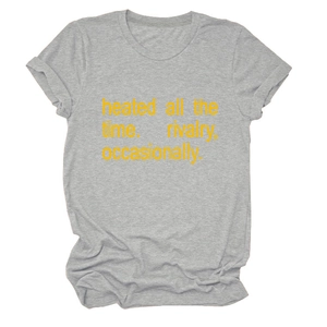 Detail of grey crewneck T-shirt showing yellow text print and rolled cuff design