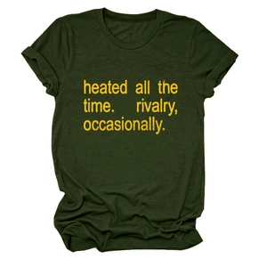Detail of dark green t-shirt featuring yellow text print and rolled cuff sleeve design