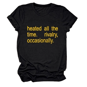 Detail of black cotton t-shirt with 'heated all the time' yellow text print