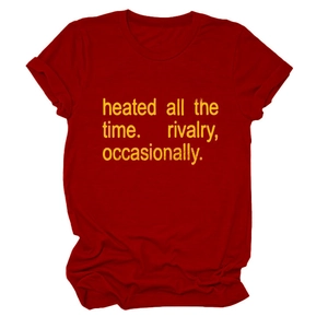 Detailed view of the yellow slogan print on the casual red crew neck cotton t-shirt