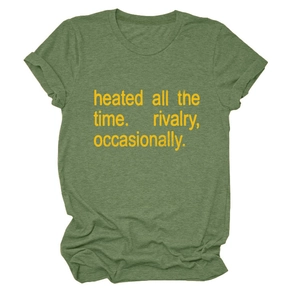 Detail of olive green t-shirt with 'heated all the time' yellow text and folded sleeves