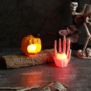 Halloween LED decoration set featuring a black cat pumpkin light and skull hand with eyeball