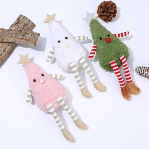 Three plush Christmas tree dolls in pink, white, and green with striped legs and stars