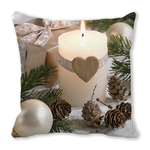 Detail of Christmas cushion cover with candle, pine cones, and rustic gift box decor