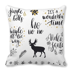 Detail of Christmas peach skin pillowcase with reindeer silhouettes and golden greetings