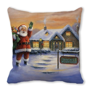 Detail of Christmas peach skin cushion cover featuring a Santa's Workshop oil painting