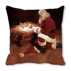 Detail of oil painting style Christmas pillow cover featuring Santa Claus and baby Jesus