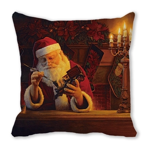 Detail of Christmas pillowcase showing Santa Claus repairing a toy train on peach skin fabric