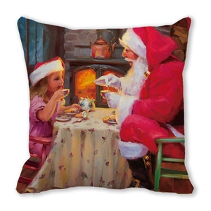 Close-up of Christmas pillow cover with Santa Claus oil painting on soft peach skin fabric