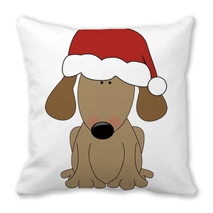 Detailaufnahme Kissenhülle aus Pfirsichhautgewebe mit niedlichem Cartoon-Hund und Weihnachtshut