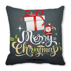 Macro detail of Merry Christmas peach skin cushion cover with Santa and gift box pattern