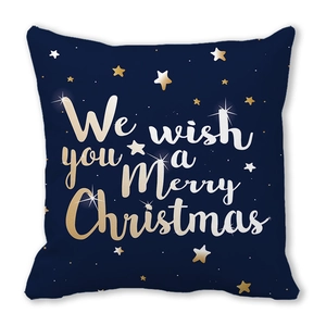 Close-up of Merry Christmas script and gold star patterns on blue peach skin pillowcase