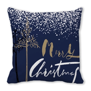 Detail of navy peach skin pillow case featuring golden Merry Christmas typography and snow