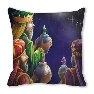 Detail of soft fabric pillow featuring the Three Wise Men Christmas illustration